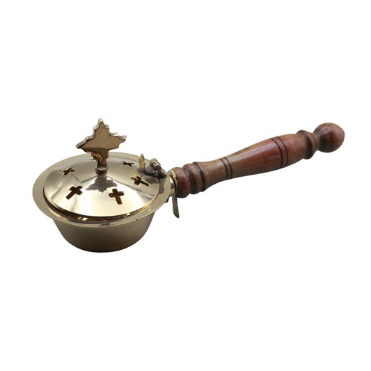 brass charcoal burner with wooden handle on white background