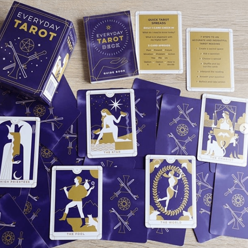 everyday tarot mini tarot deck  cards spread out on table