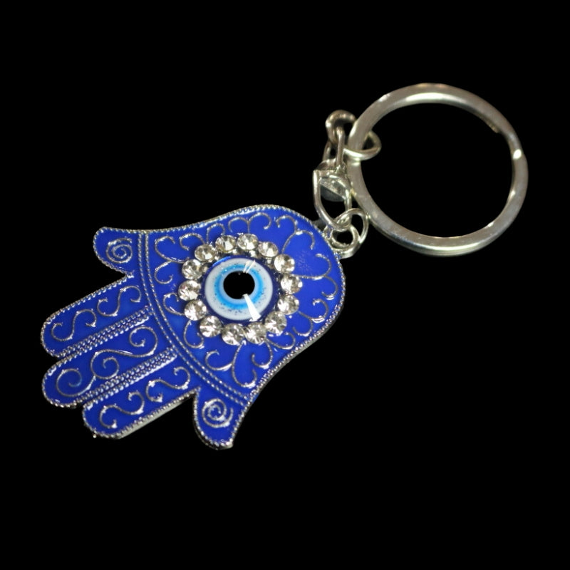 hamsa hand keyring- blue hand with palm open  with a blue and white round eye in the centre, surrounded by diamantes on a silver chain attached to a silver ring