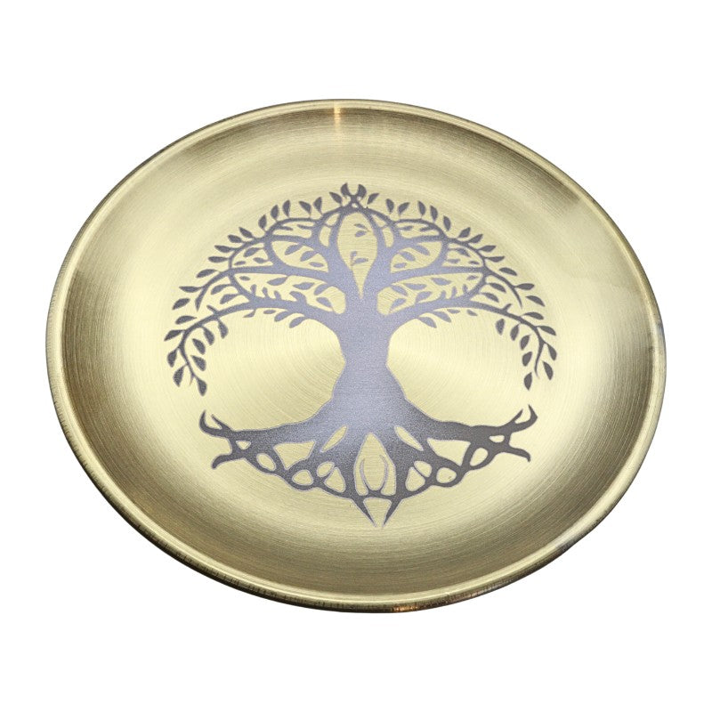A round brass tray with a brushed metallic gold finish, featuring a dark gray tree of life design printed in the center, set against a plain white background.