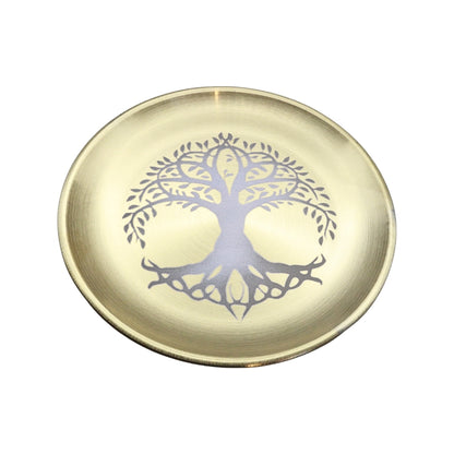 A round, shallow brass-colored dish featuring a stylized tree of life design printed in the center, set against a plain white background.
