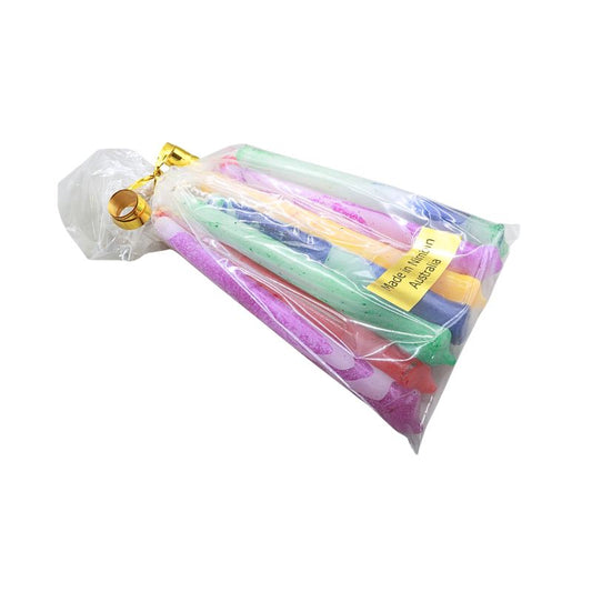 12 marbled candled in a clear cellophane packaging with gold bow and label