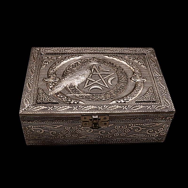 embossed metal tarot box with a raven on top