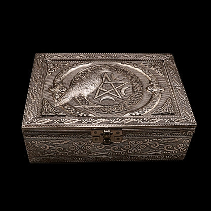 embossed metal tarot box with a raven on top