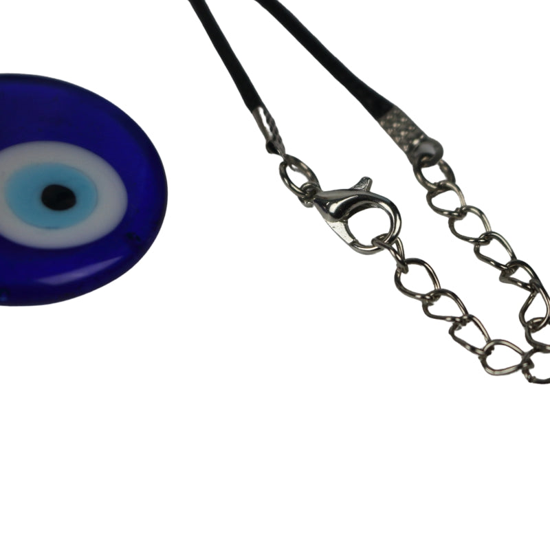 blue, white, light blue and black concentric circles  formed into an eye shaped bead, hung on a black cord with a silver clasp, on a white background