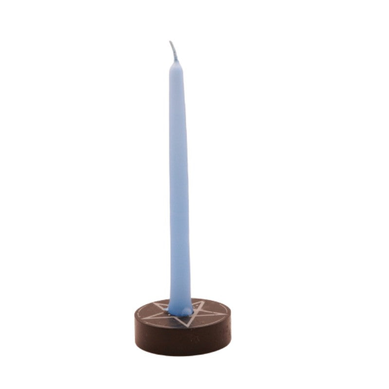 light blue  tiny taper candle in a pentacle candle holder