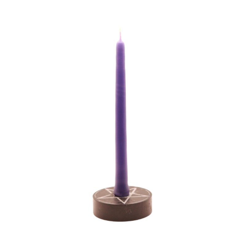 purple  tiny taper candle in a pentacle candle holder