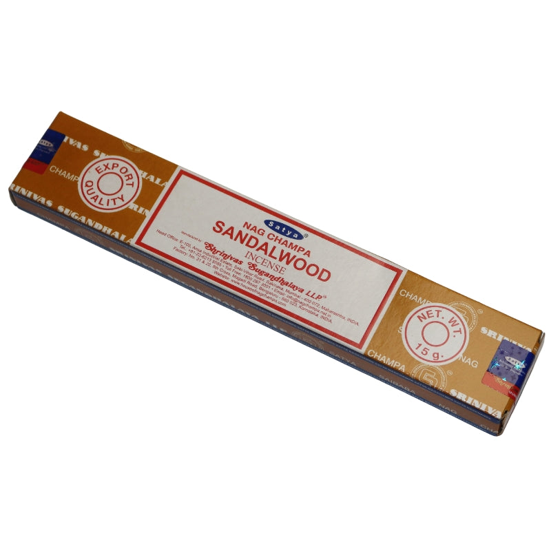 tan and white coloured box of satya sandalwood incense