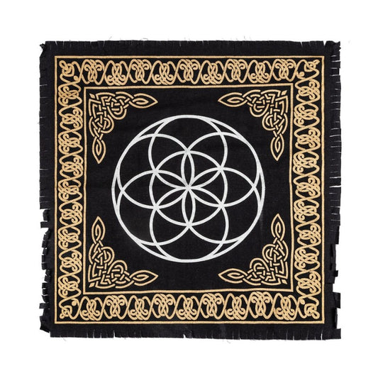 Black altar cloth  with gold border and white seed of life geometric design on a white background
