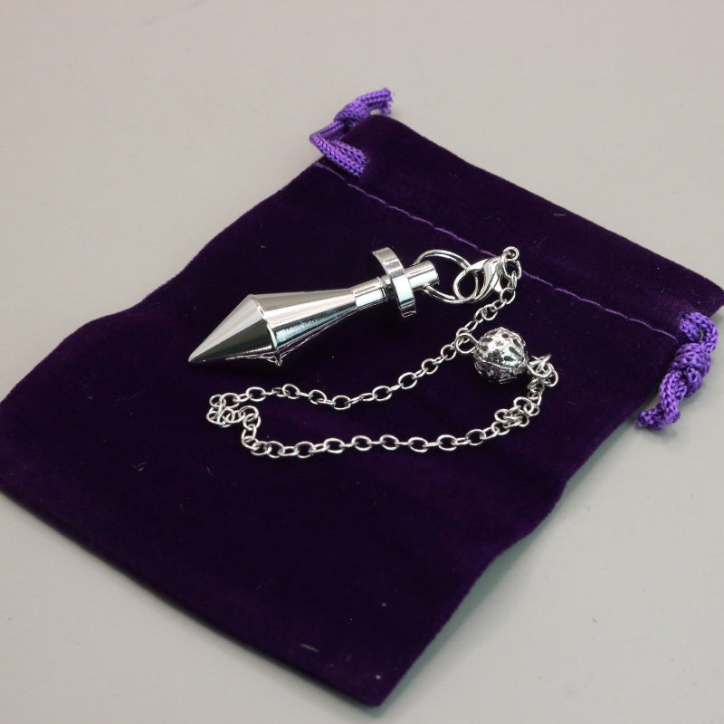 Silver Pendulum On Purple Velvet Bag