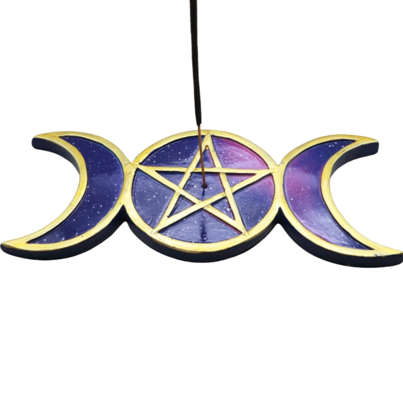 gold, purple and pink incense holder in the shape of a triple moon with a pentacle in the centre of the middle moon holding an incense stick