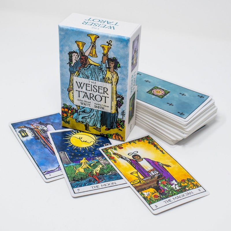 Weiser Tarot box with 3 tarot cards in front and a stack behind