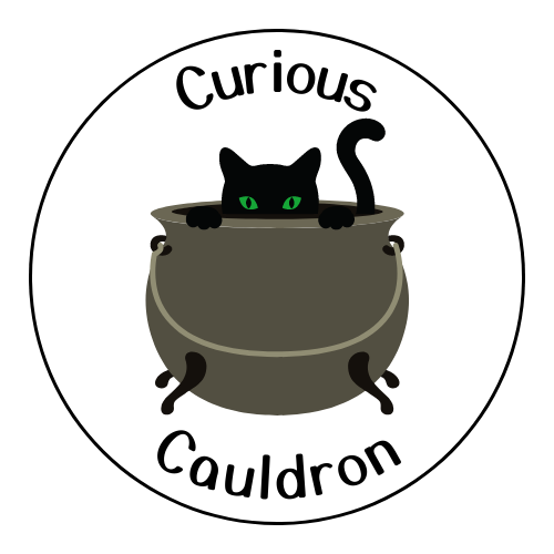 Curious cauldrons circle logo with a black cat sitting in and peering over the edge of a cauldron