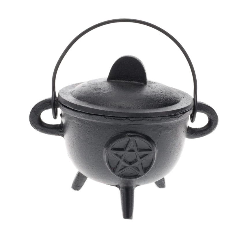 Black cast iron cauldron with pentacle design on front