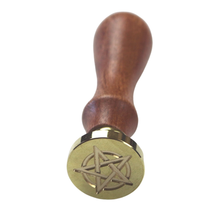 Brass wax seal stamp of a pentagram on a wooden handle