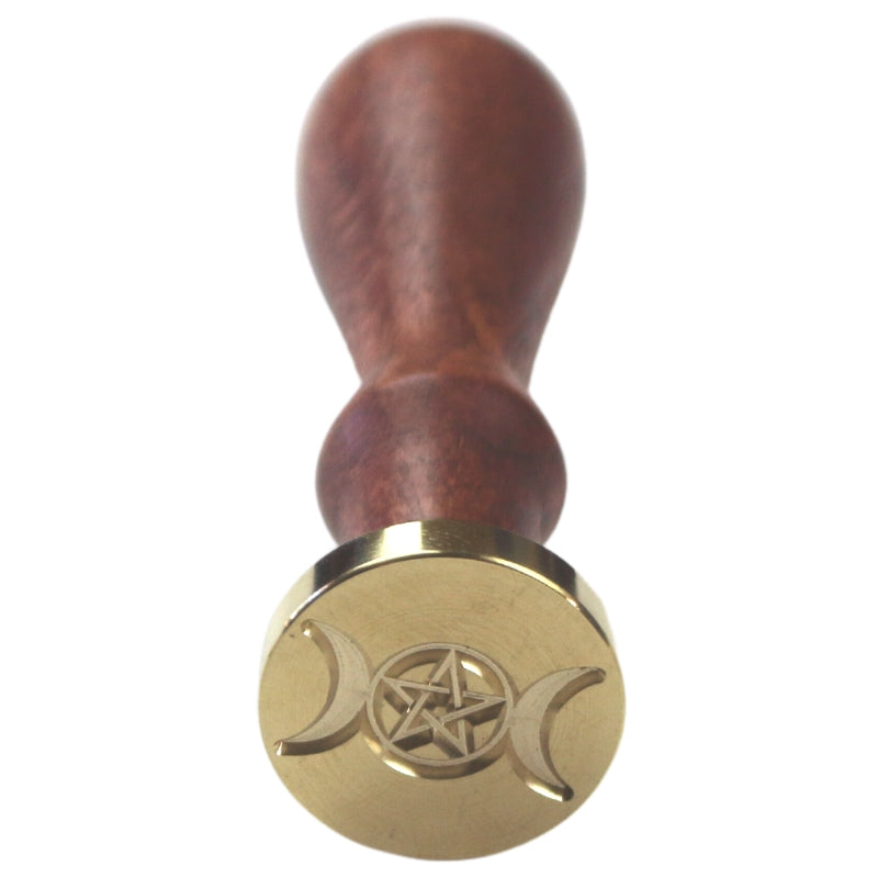 Brass wax seal stamp of a triple moon with pentacle in the middle on a wooden handle