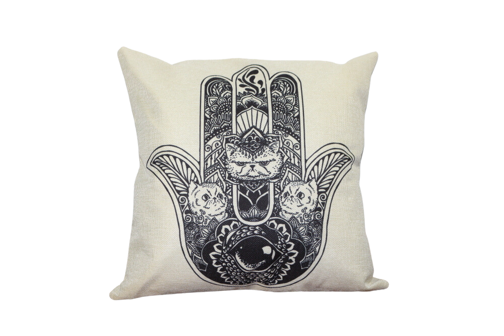 linen white cushion with a black hamsa symbol printed on front