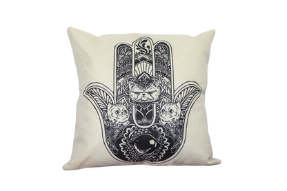linen white cushion with a black hamsa symbol printed on front