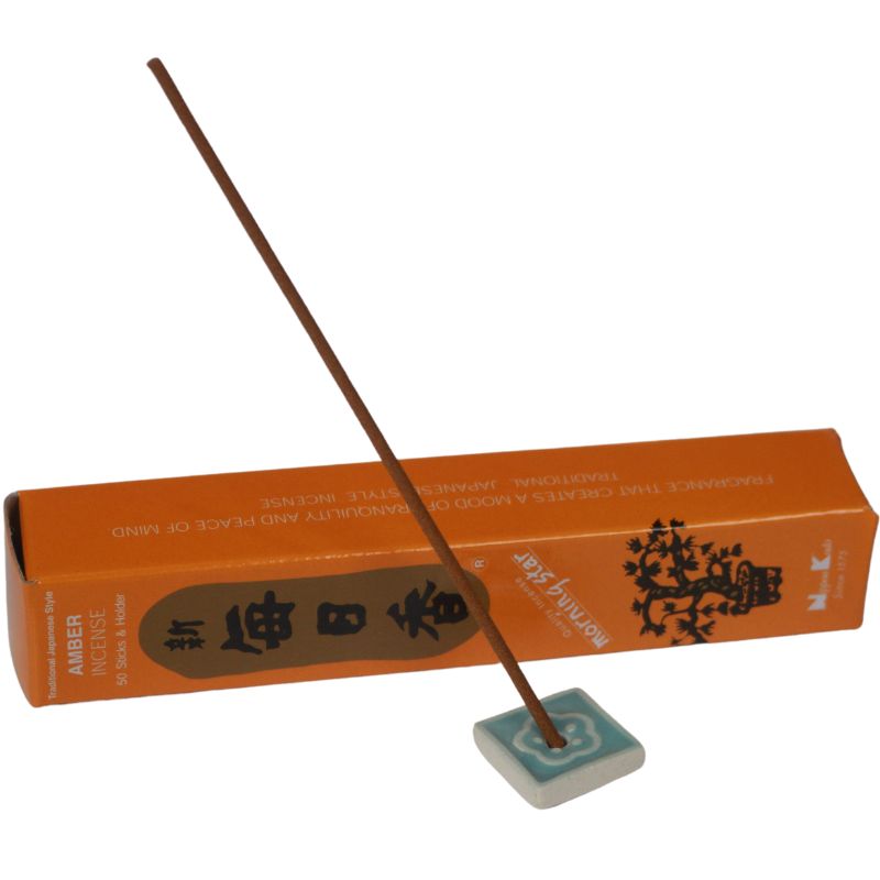 rectangle box of japanese morning star "amber" incense sticks  with an incense tile holding an incense stick