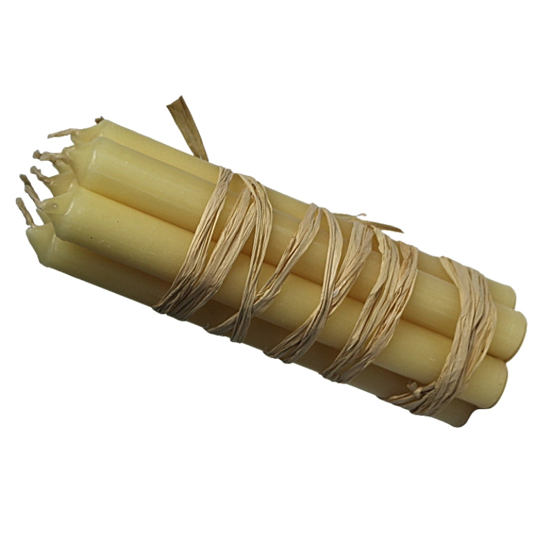 bundle of 7 natural beeswax straight dinner candles wrapped in raffia on a white background
