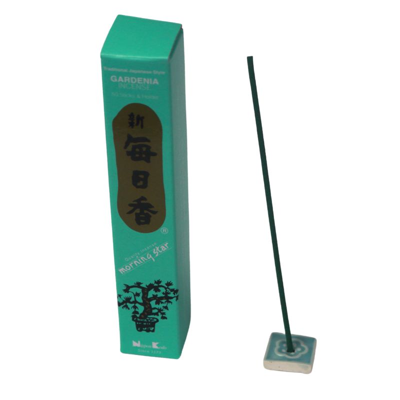 rectangle box of japanese morning star "gardenia" incense sticks next to a tile incense holder