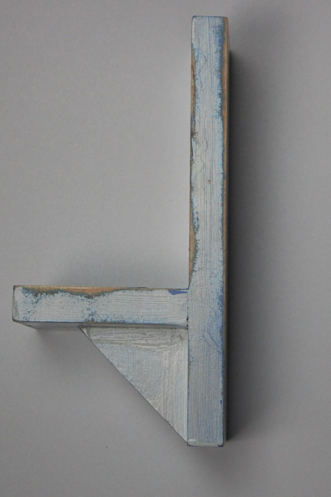 distressed blue and white wooden wall mounted candle or ornament shelf  side view