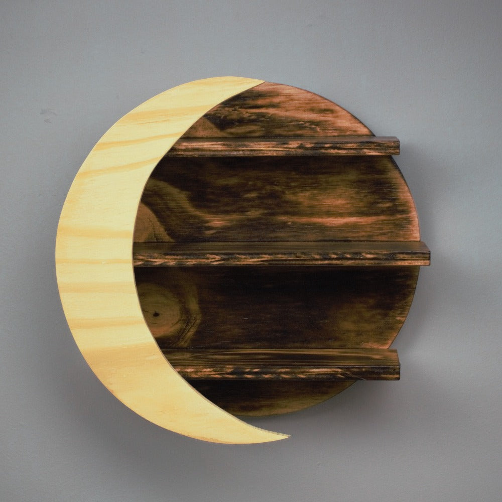 wooden crystal moon shelf with light wooden crescent moon in front of 3 shelves on a grey wall