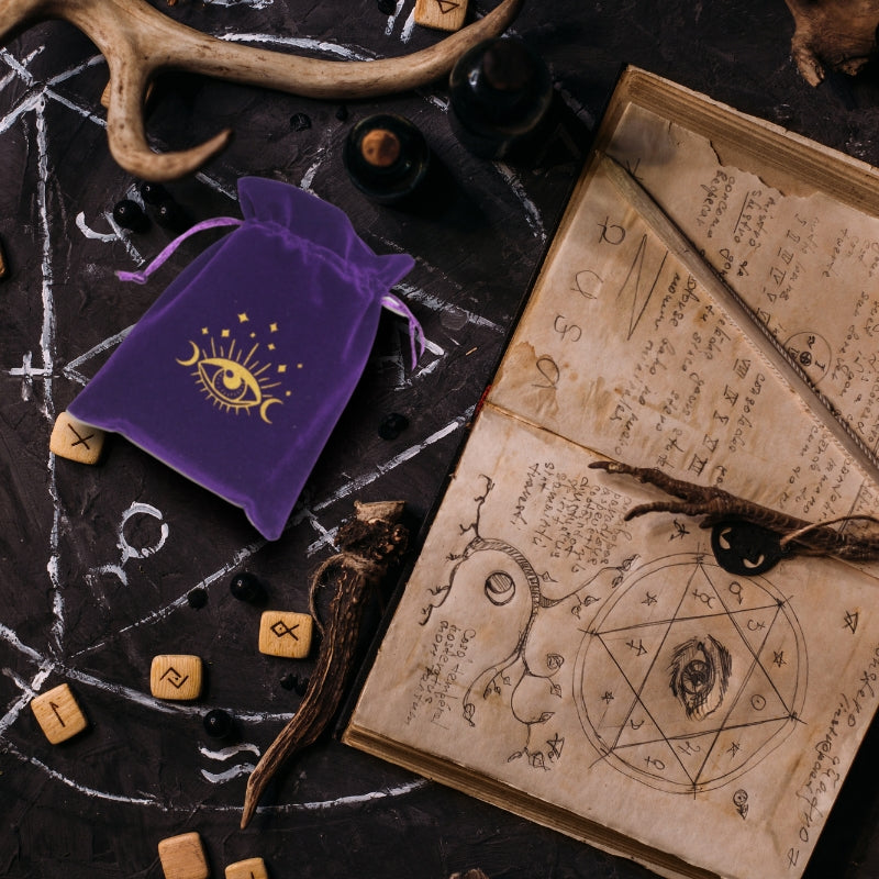 Purple Drawstring Tarot Bag next to grimoire and runes