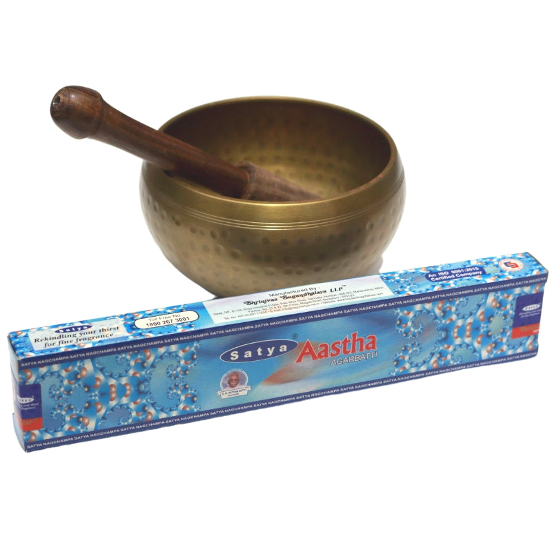 aastha satya incense- blue box in front of a brass singing bowl
