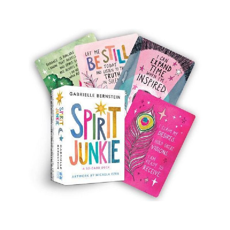 spirit junkie tarot deck and 4 cards in the background