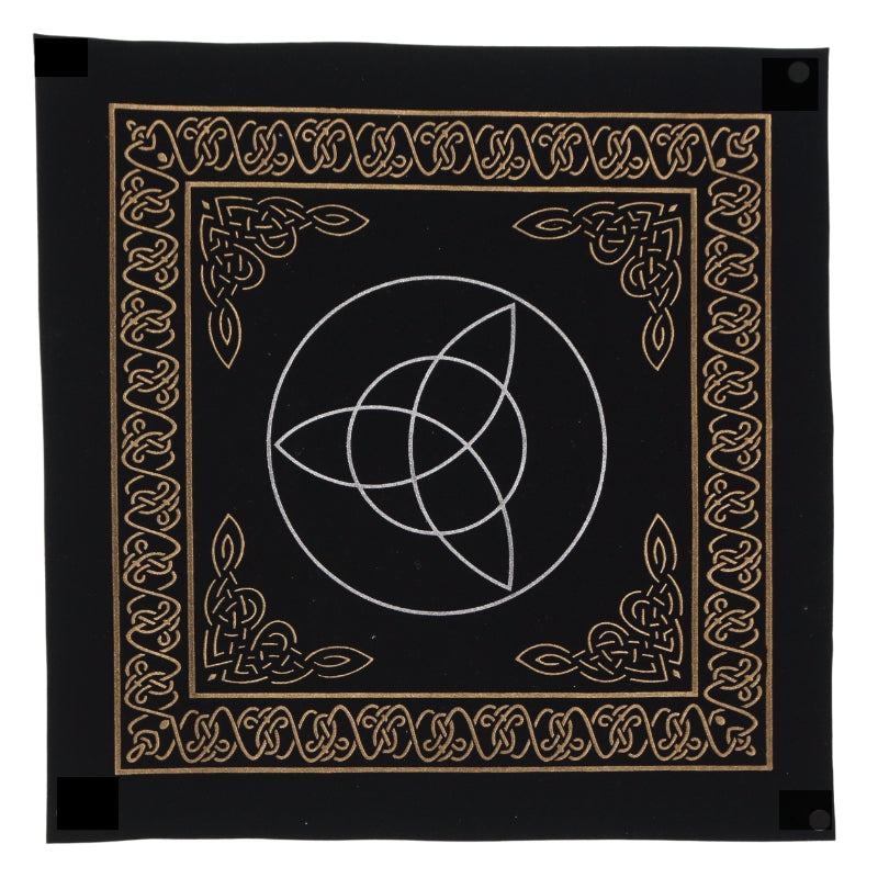 black square tarot cloth with gold celtic patterned border and inner corners  white triquetra trinity knot symbol in middle