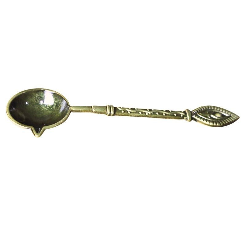 ornate wax melting spoon with a spout for wax pouring